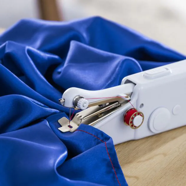 JML  Magic Stitch - Hand-held, portable sewing machine for on-the-spot  repairs and alterations